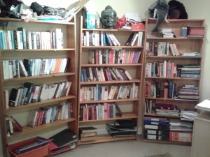 The books look tidy, now I need to sort the mess on top!